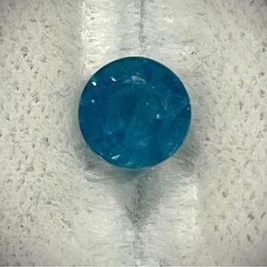 1.49 carat round shaped blue sapphire (September birthstone)
